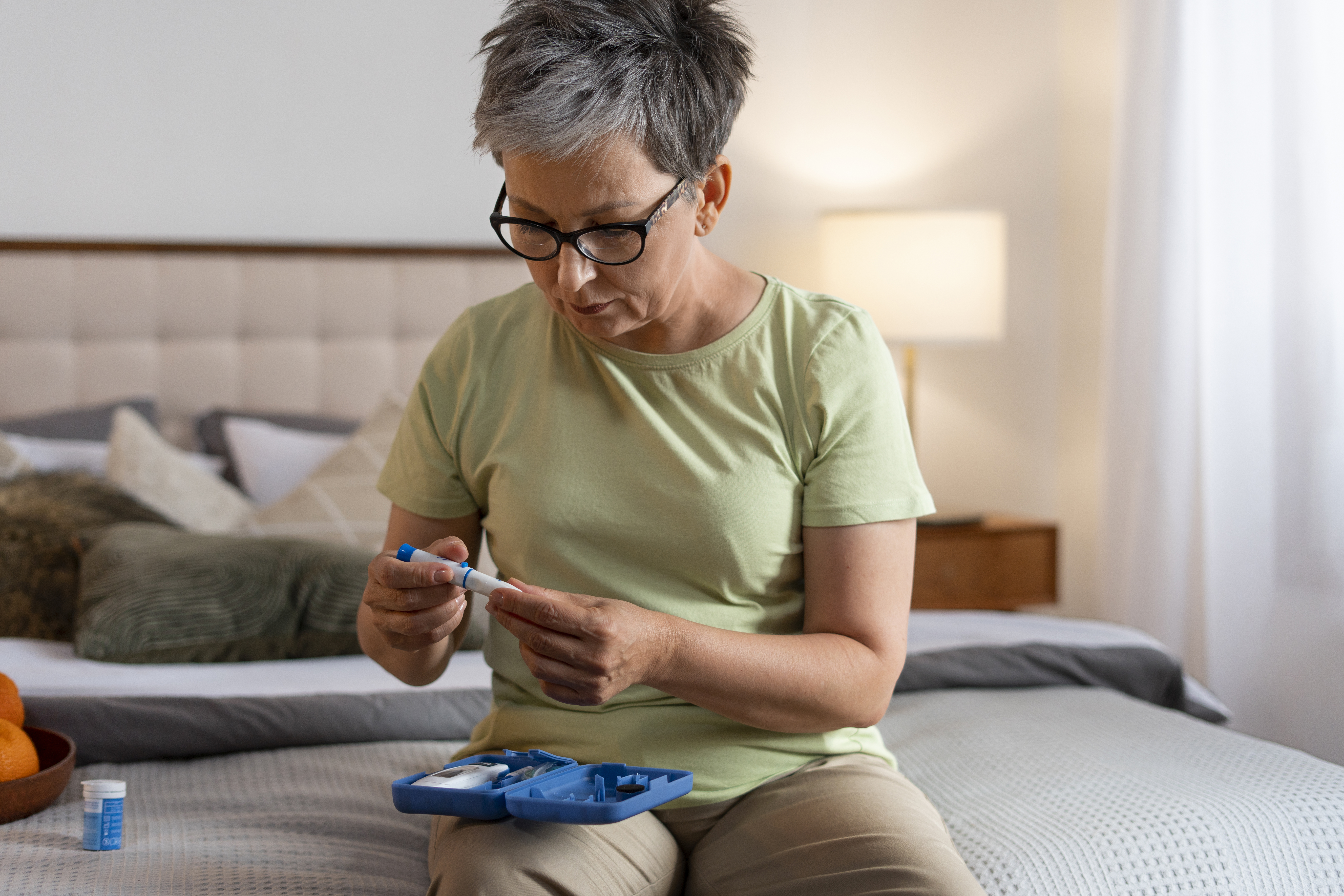 medium-shot-diabetic-woman-checking-her-glucose-level