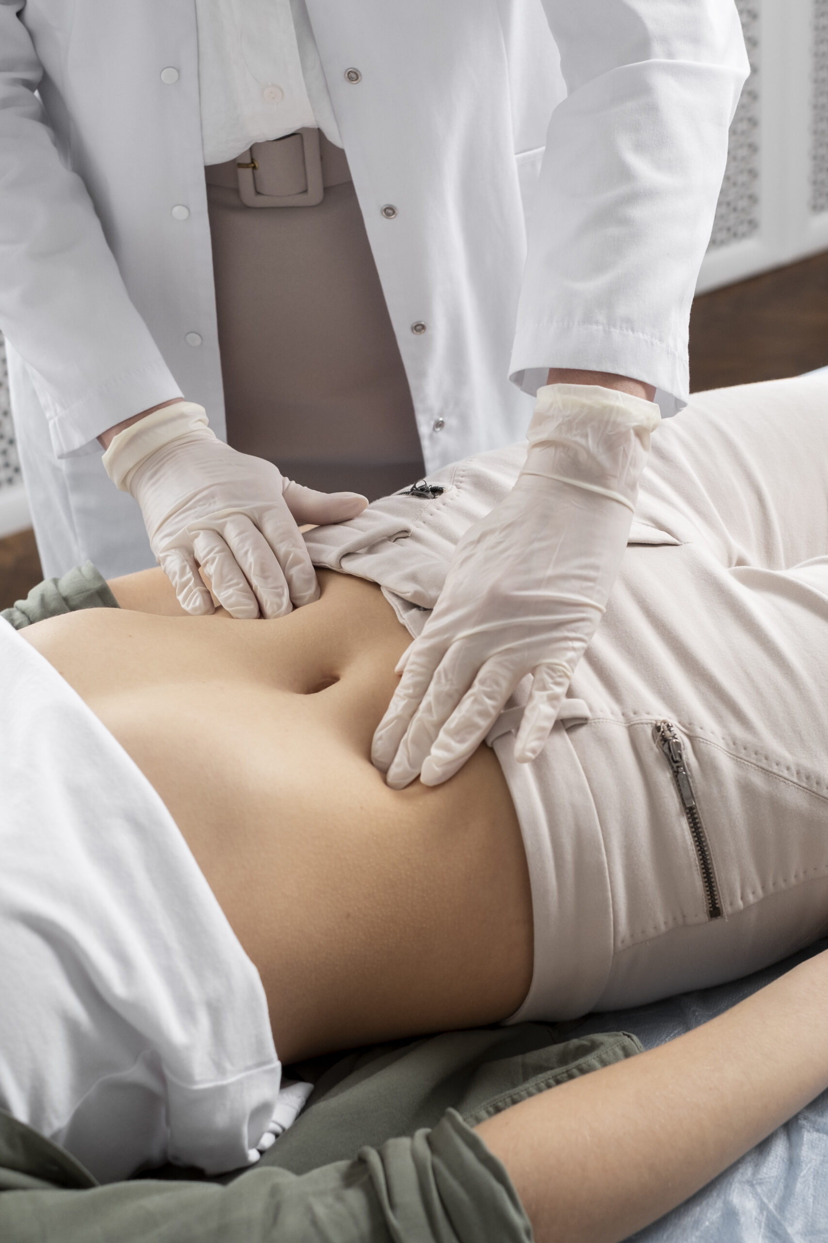 high-angle-doctor-checking-patient